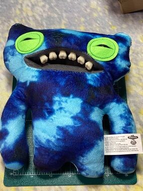 Fuggler Blue Tie-Dye Monster Plush Stuffed Animal with Green Eyes